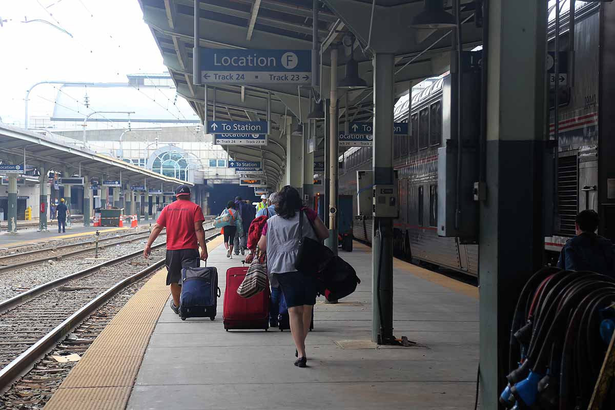 Washington, DC, Union Station platform, passengers walking towards the station building