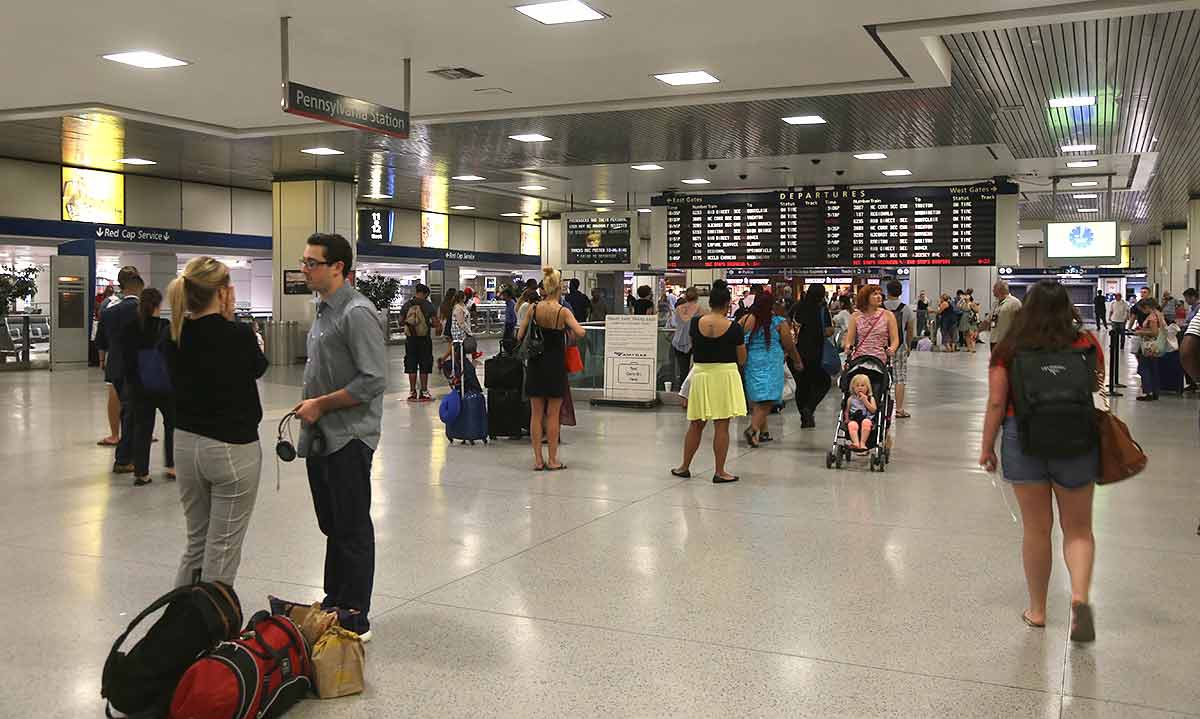 Penn Station in New York, the Amtrak Concourse, with people coming and going