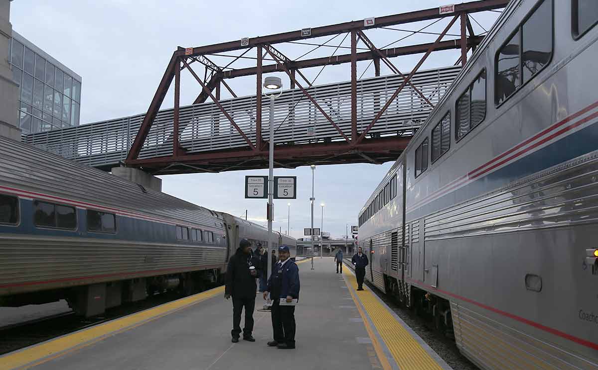 Kansas City Union Station with the Southwest Chief on the right and a River Runner train on the left