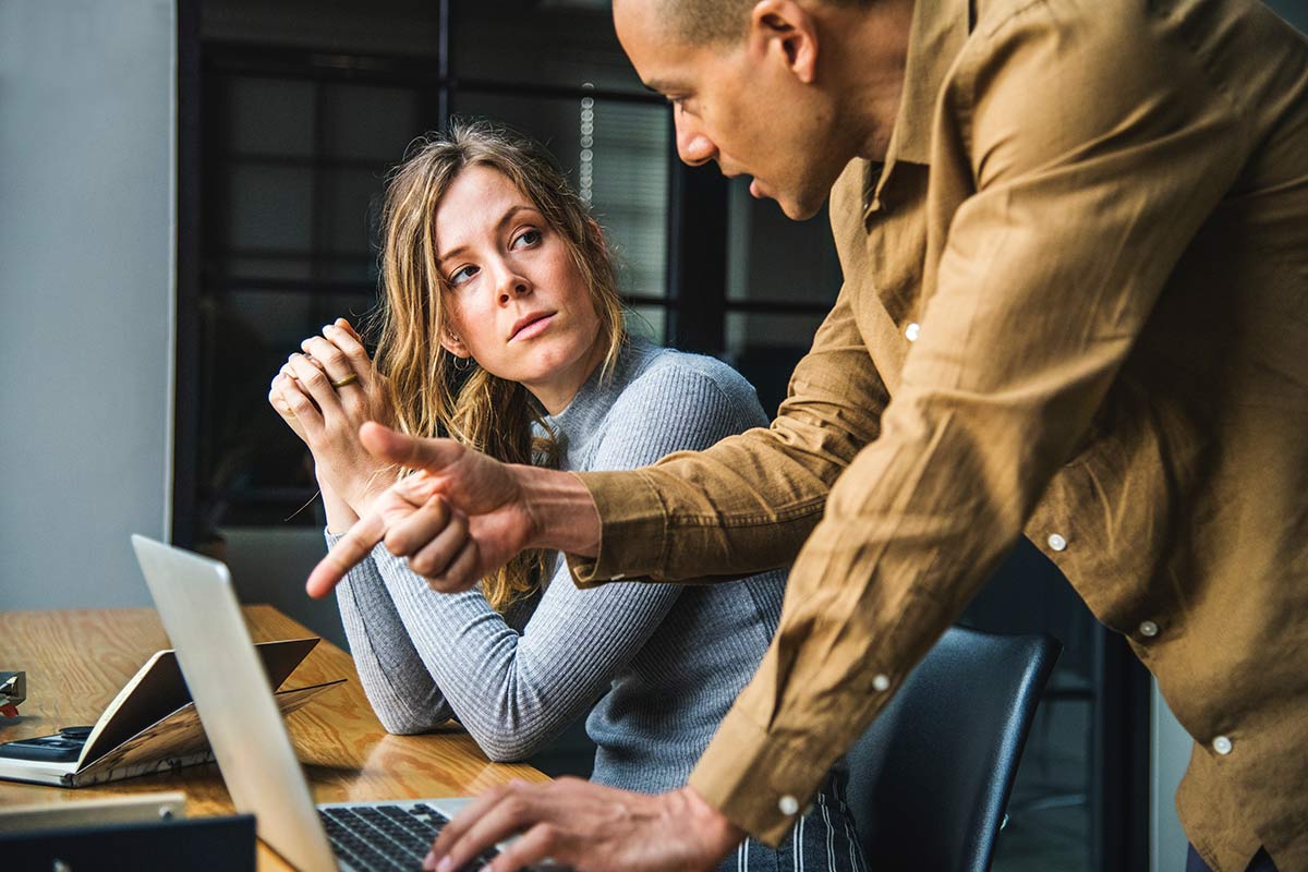 woman and man in animated conversation