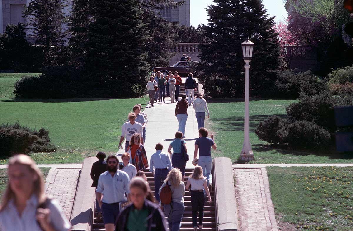 Students walking up the hill at the University of Iowa Pentacrest