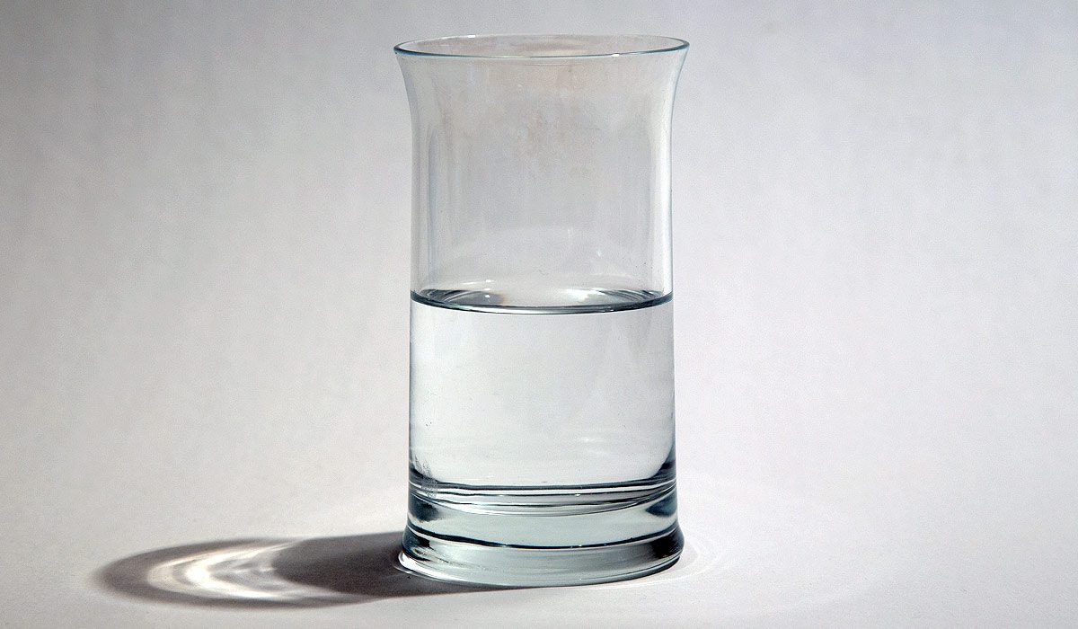 Glass of water filled to the half way mark — is it half full or half empty?