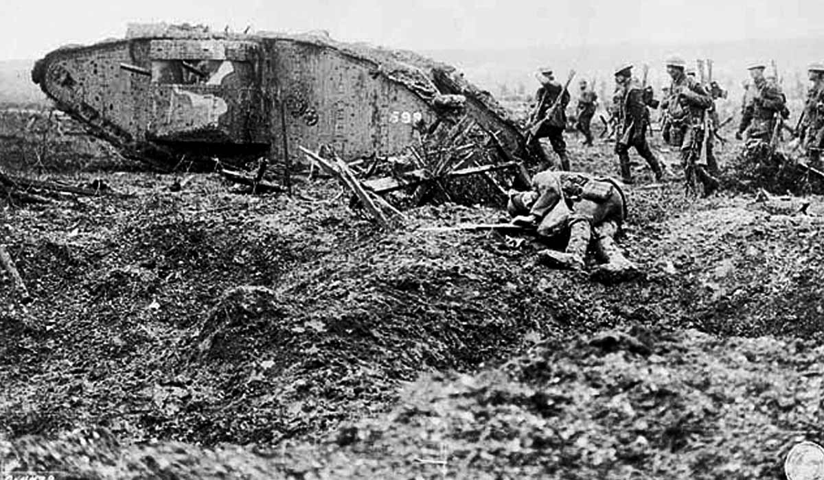 World War 1 battlefield - soldiers advancing behind a tank