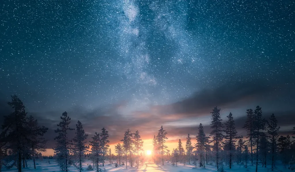 winter sunrise with stars in the sky