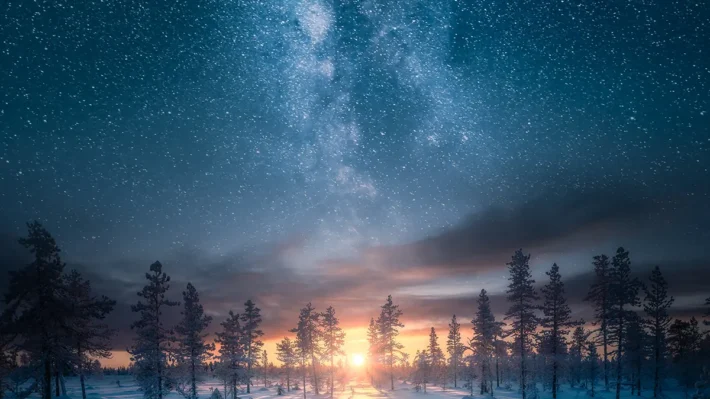winter sunrise with stars in the sky