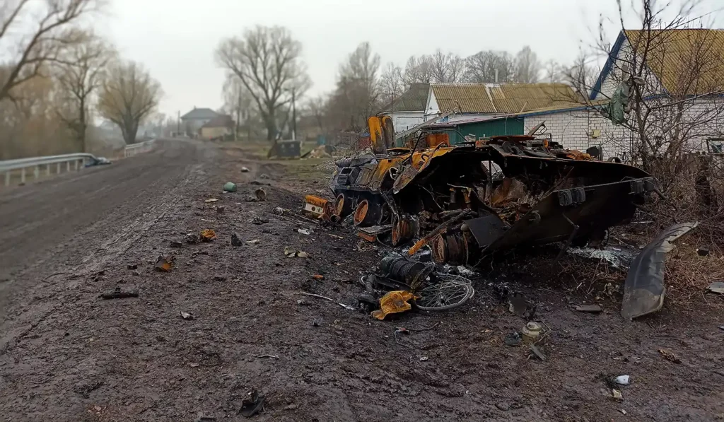 Destroyed Russian armored vehicle by roadside in Ukraine